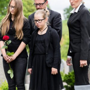 image of a family at a funeral